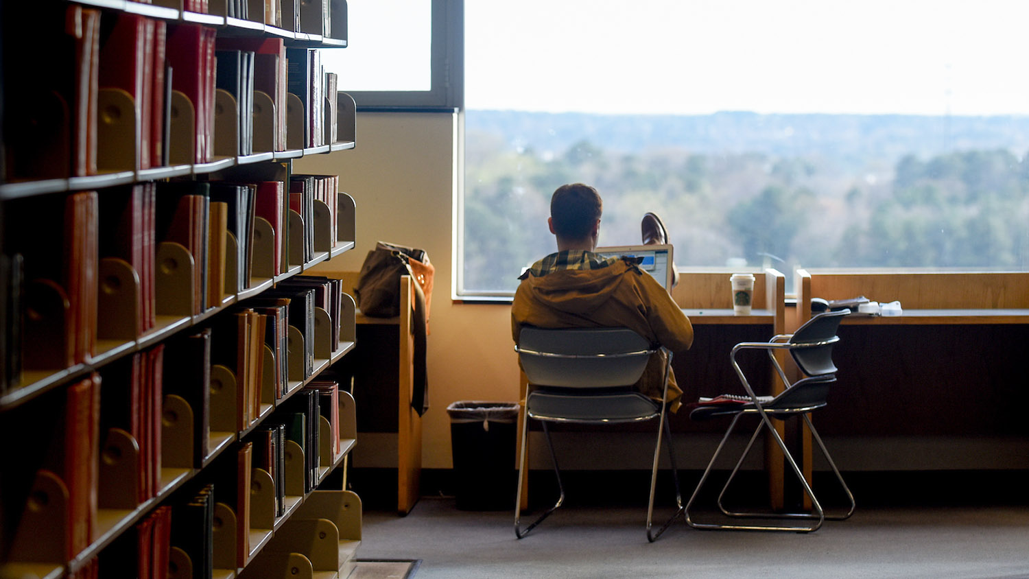 a student studying at library